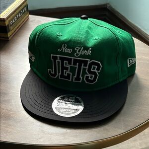 New Era Green and Black New York Jets Flat Brim Snapback